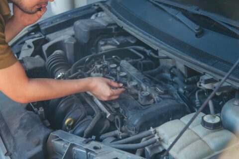Mechanic Resolving Engine Issue of a BMW in Portland, OR