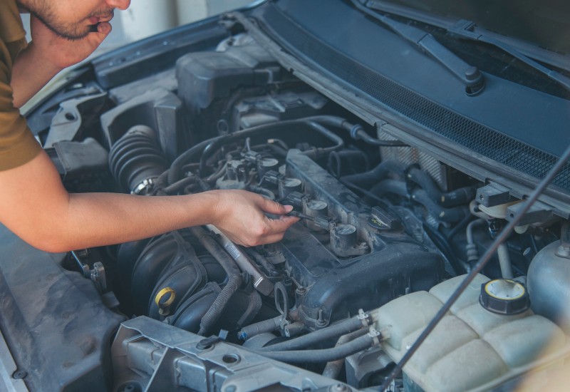 Mechanic Resolving Engine Issue of a BMW in Portland, OR