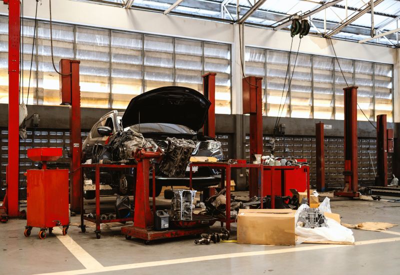 A BMW Car Getting an Exhaust System Repair in Portland, OR