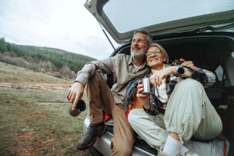 A Couple on a Road Trip with Their Mini Car In Portland, OR
